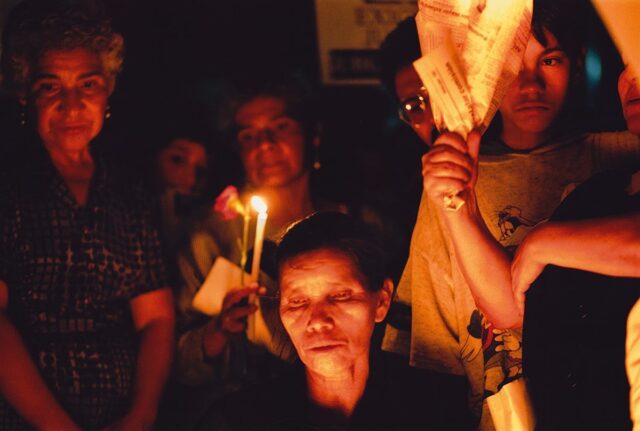 People light candles outside the San Sebastian Church the day after of the assassination of Bishop Juan Jose Gerardi